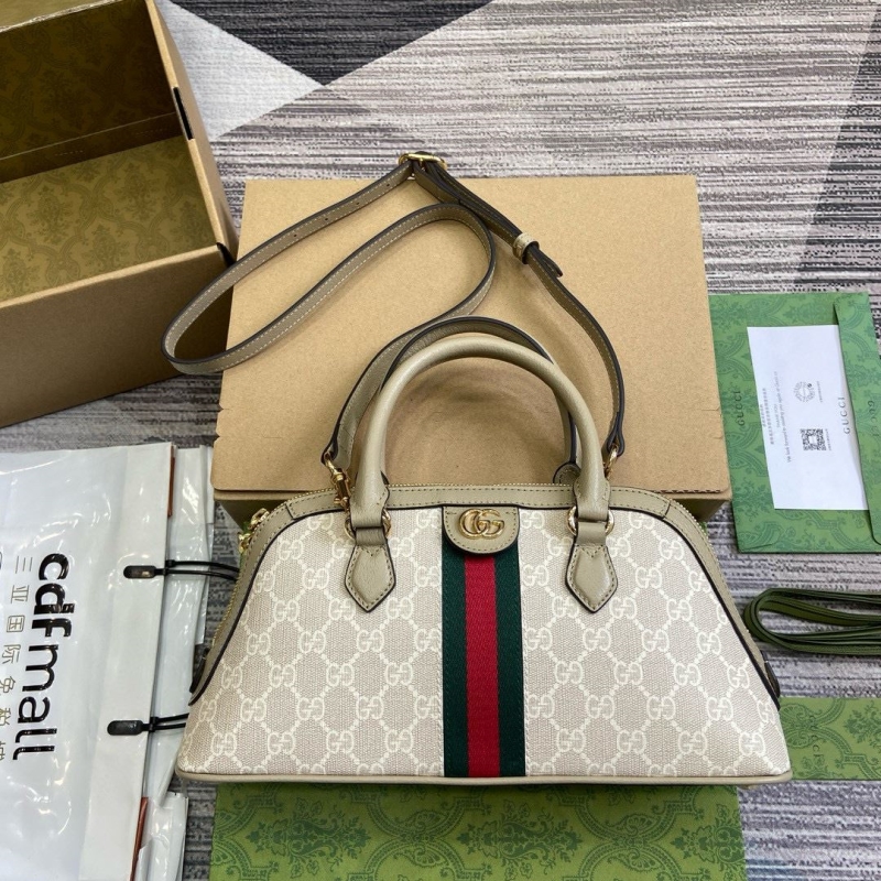 G*u*i top handle bags